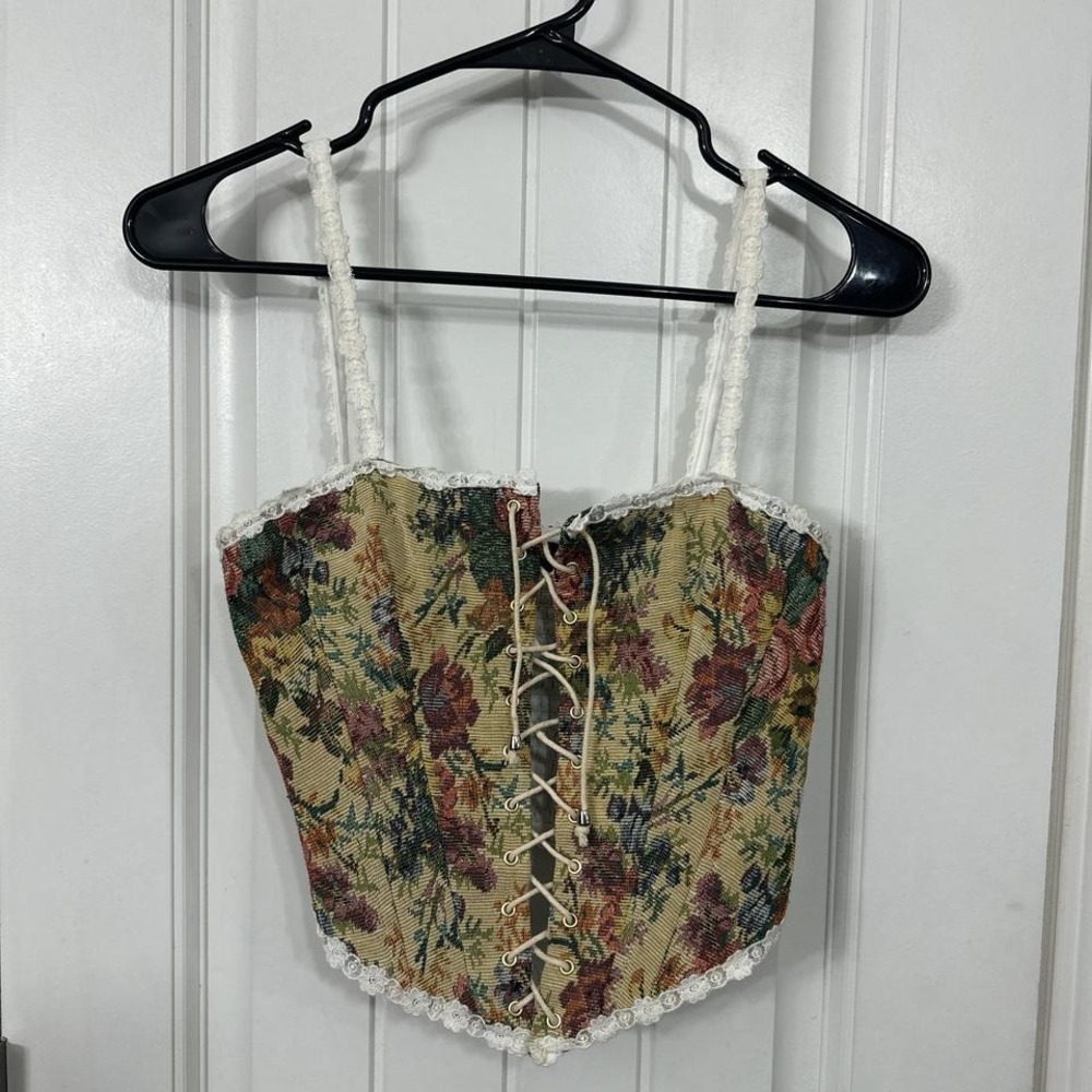 Floral corset top with lace up front and adjustable strap. XS